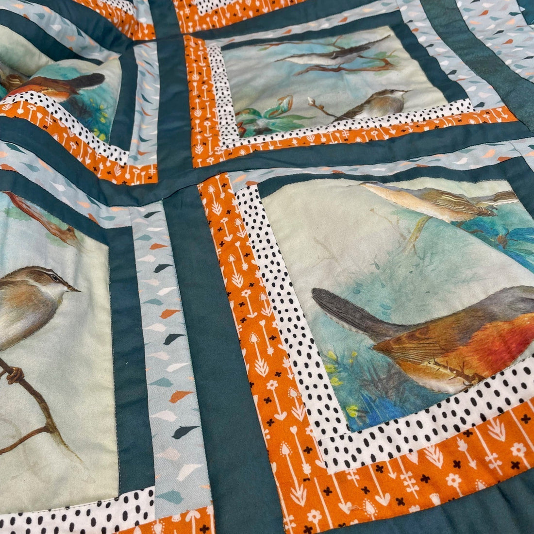 patchwork et quilting se complètent pour créer ce quilt création Fran Buyle, FibraCreativa
