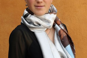 Versatile silk scarf worn around the neck